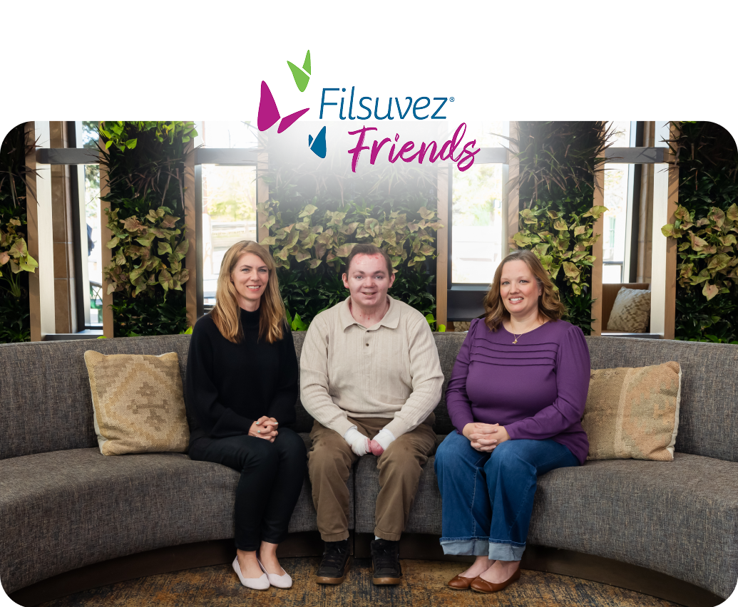 Three people sitting together under the Filsuvez Friends logo