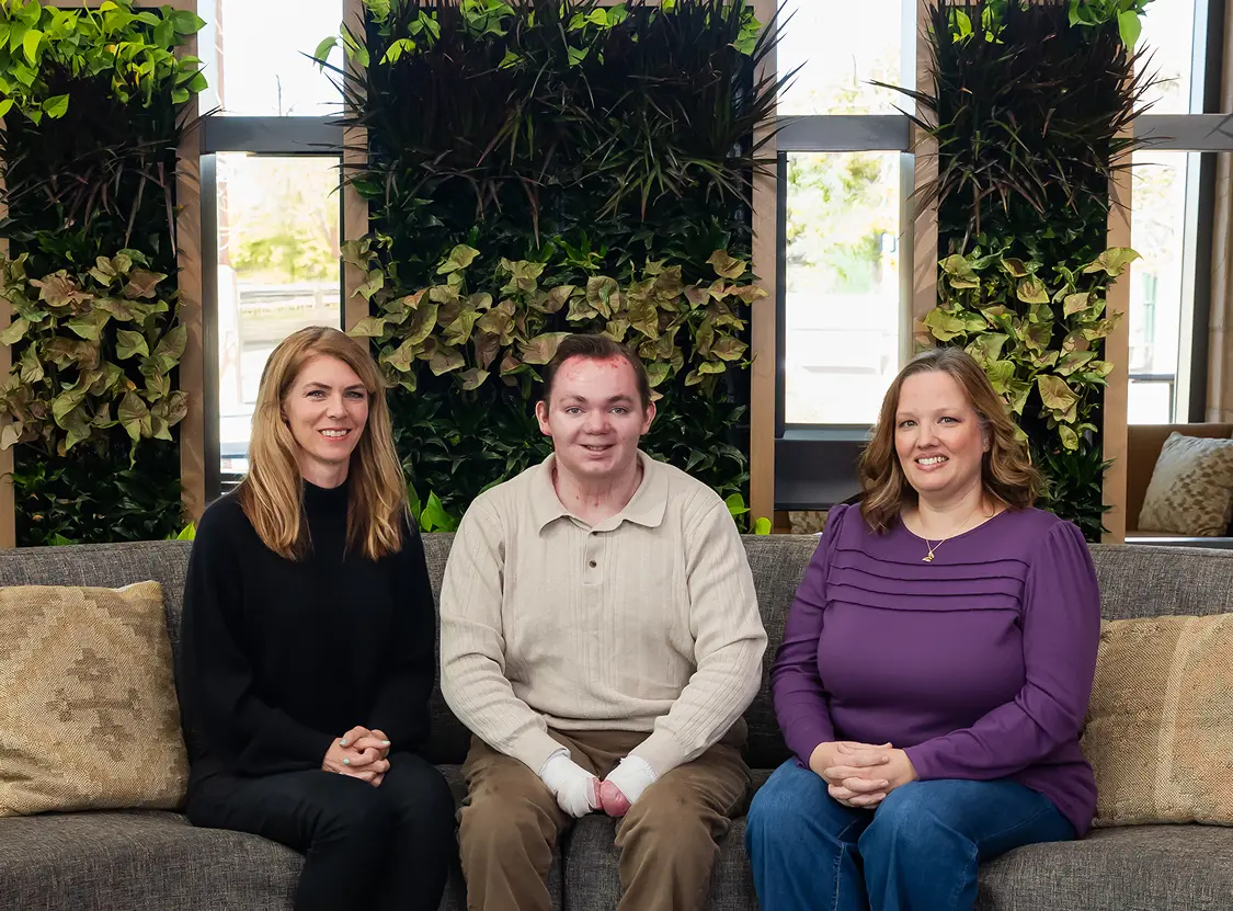 Three people sitting together