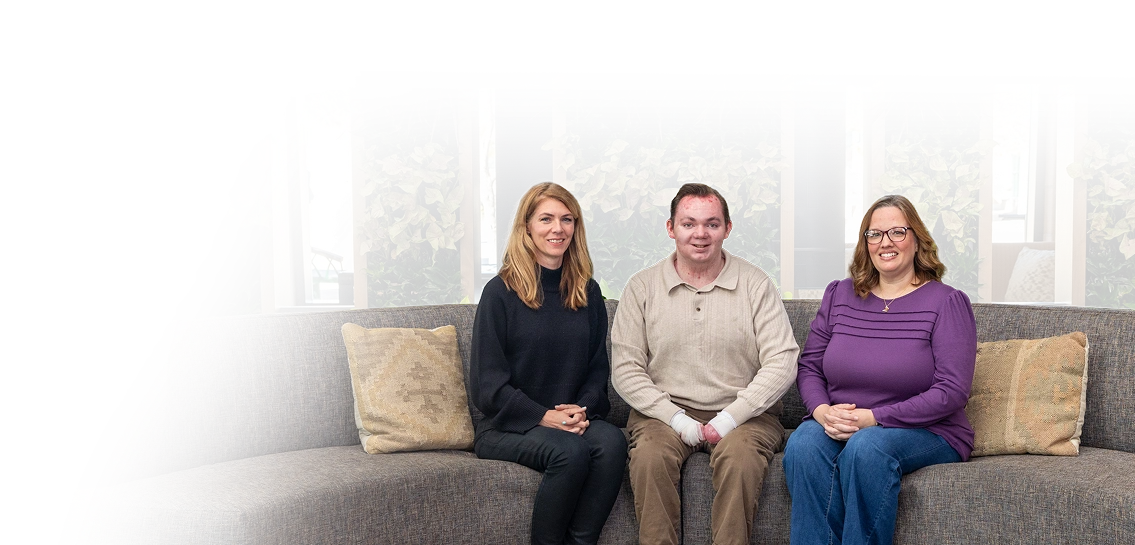 Three people sitting together